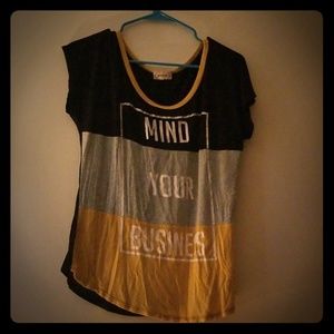 Blouse black, gold, and gray colors.